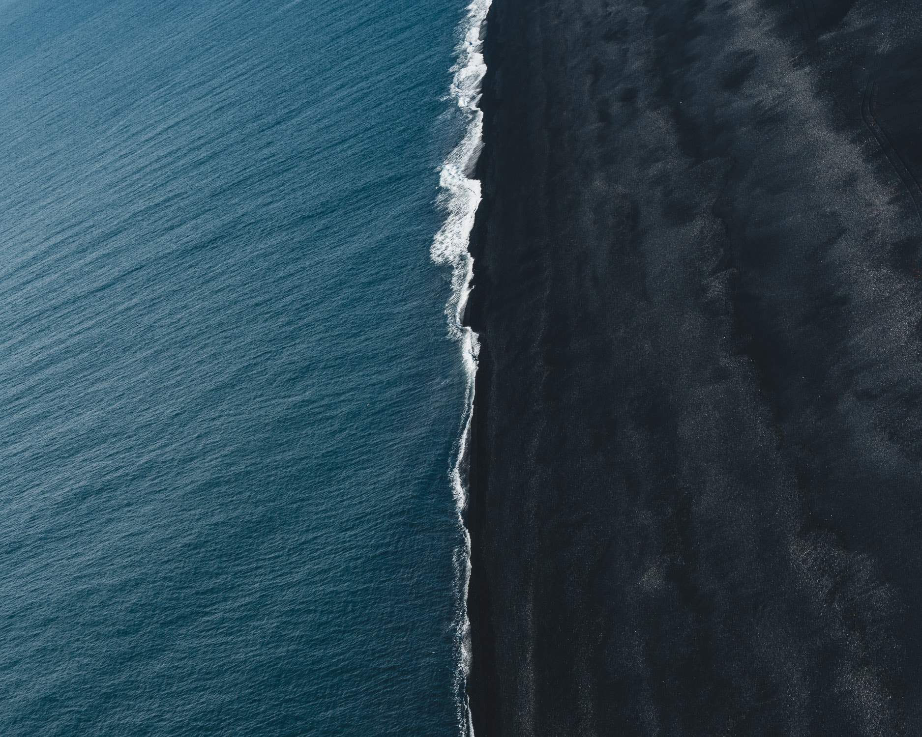 Black Sand Beach South Shore, Iceland — fine art print by Javier Delabat